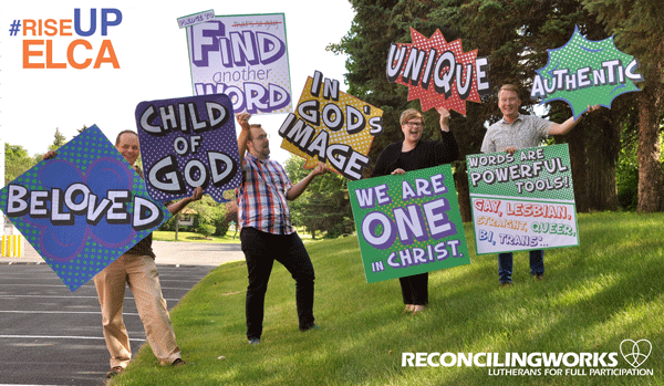 ReconcilingWorks Staff hold up youth gathering signs